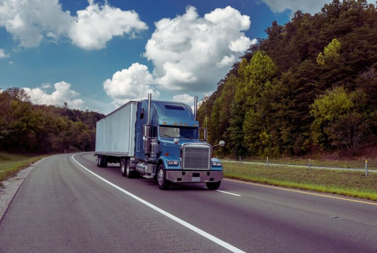 Semi-truck traveling on a rural highway
